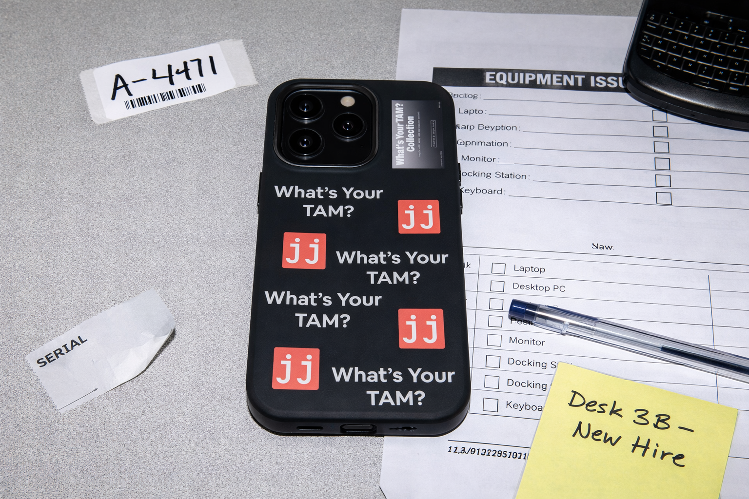Black iPhone Pro Max case featuring 'What's Your TAM?' text and red JJ logos in a corporate humor style.