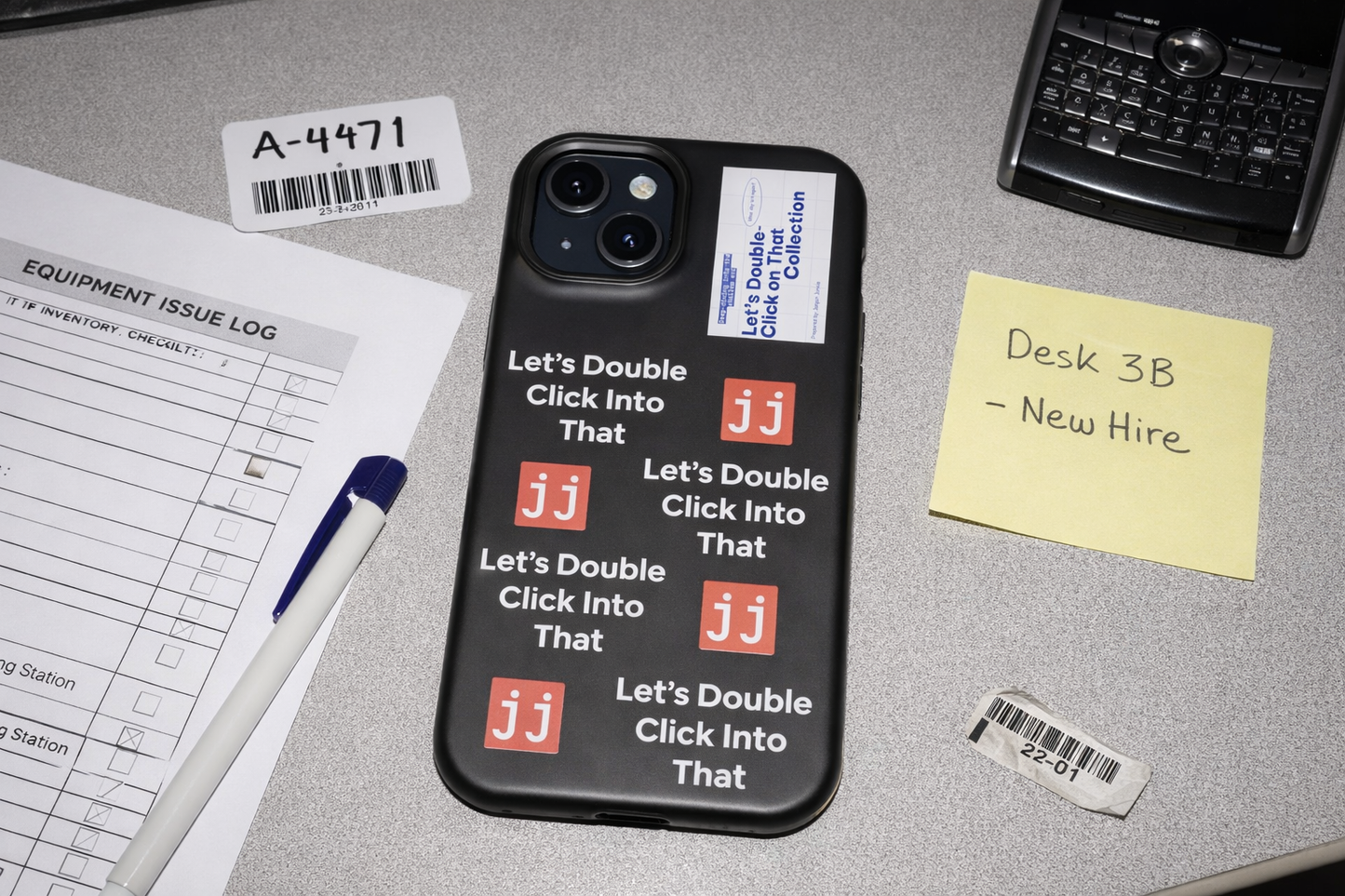 Jargon Junkie black iPhone 15 case with Let's Double Click Into That text and JJ logos on office desk with IT inventory checklist corporate humor phone accessory