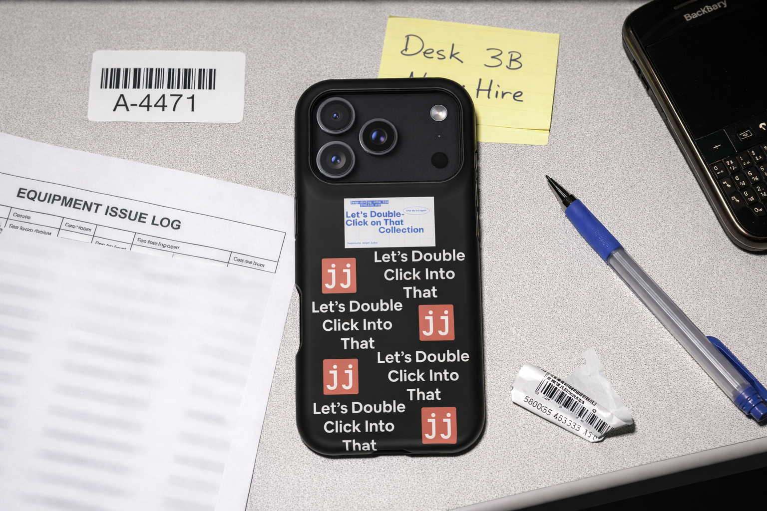 Jargon Junkie black iPhone 17 Pro case with Let's Double Click Into That text and JJ logos on office desk with equipment issue log corporate humor phone accessory