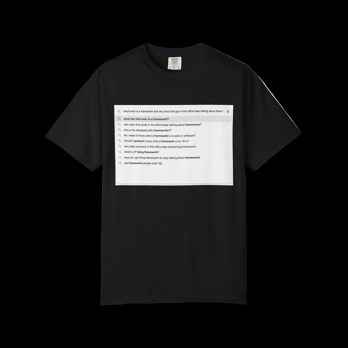 Black t-shirt with a printed design on a black background. T-shirt with 'What Is A Framework' in a Google search window. Corporate, funny, business humor. 