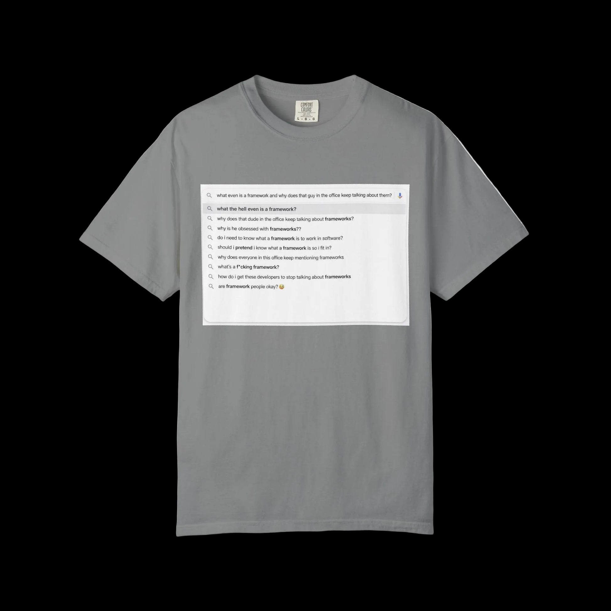 Gray t-shirt with a printed design on a black background. T-shirt with 'What Is A Framework' in a Google search window. Corporate, funny, business humor. 
