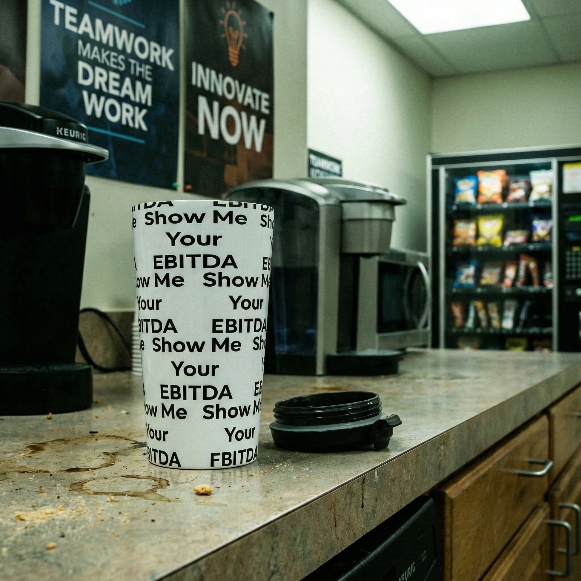 Jargon Junkie white tumbler with Show Me Your EBITDA text pattern in office break room corporate humor drinkware