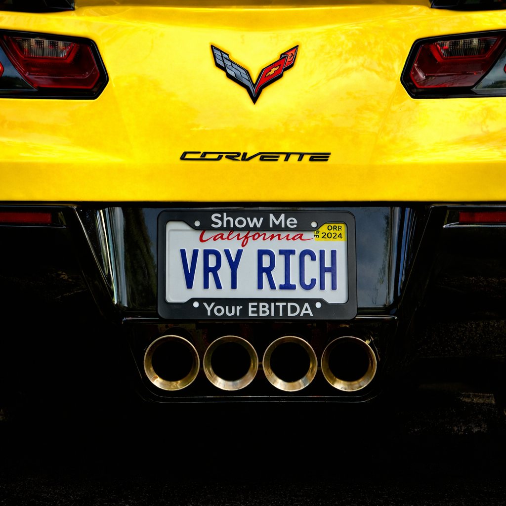 Jargon Junkie black license plate frame with Show Me Your EBITDA text on yellow Corvette corporate humor car accessory