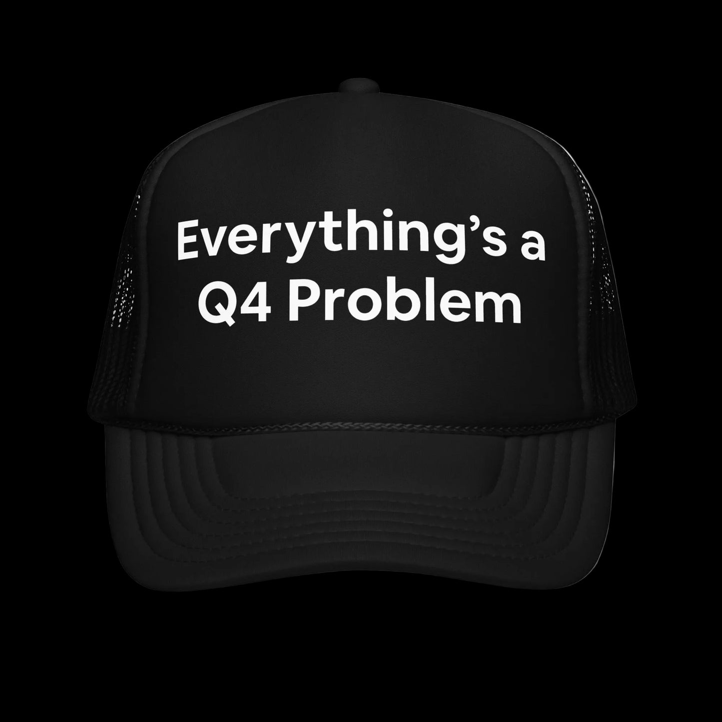 Jargon Junkie black trucker hat front view with Everything's a Q4 Problem graphic corporate humor design